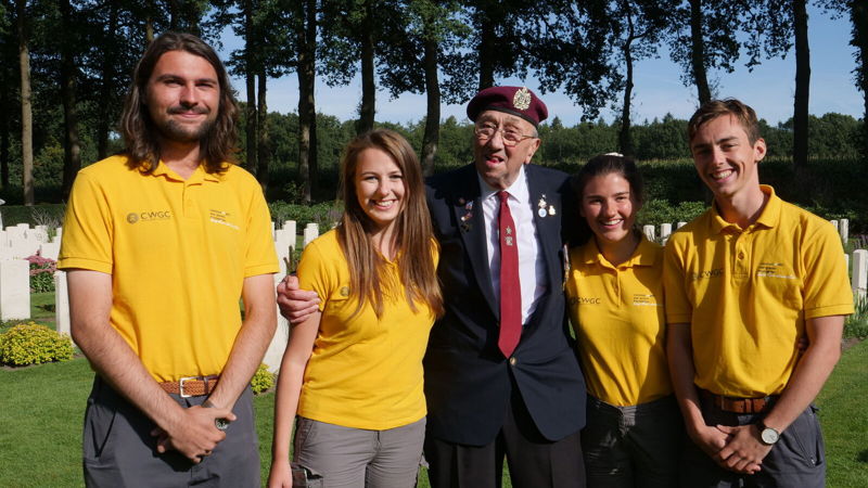 Arnhem Veteran with CWGF guides at Arnhem Oosterbeek War Cemetery