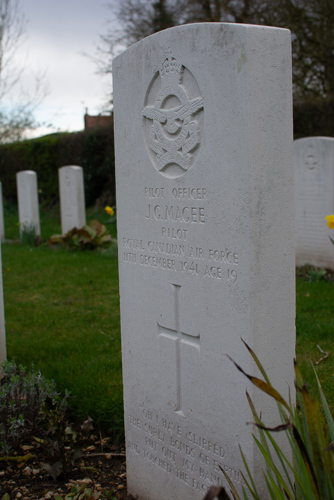 Headstone of John Gillespie McGee Junior at Scopwick Burial Ground with carved RAF regiment badge.