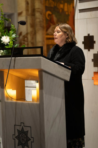 Actress Joanna Scanlan delivering a reading at the pulpit of the Guards' Chapel London