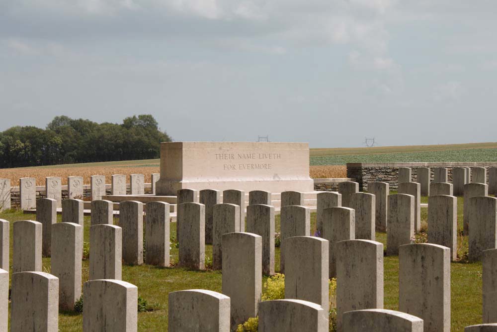 Stone of Remembrance amongst the headstones at Gommercourt Cemetery No.2.