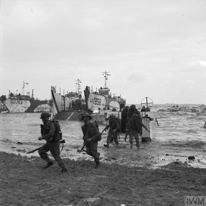 British Commandos exiting a landing craft on Gold Beach, Normandy 44.
