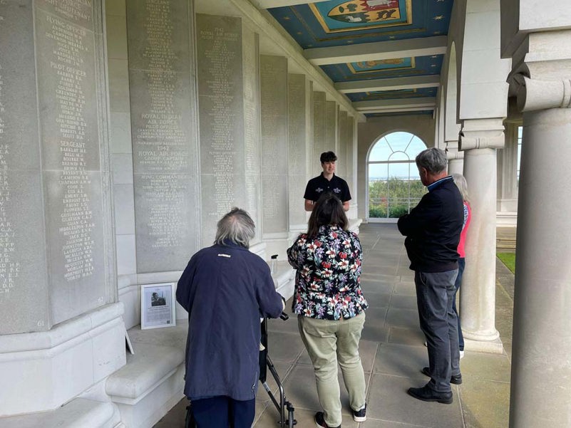 Volunteer guide Marcus talking to visitors to the Runnymede Memorial on a tour