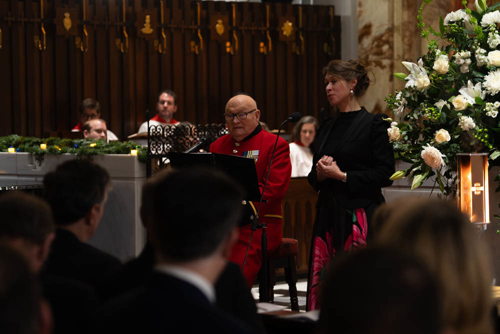 Colin Thackery, left, sings with Emma Brown, right, at the Guards' Chapel, London.