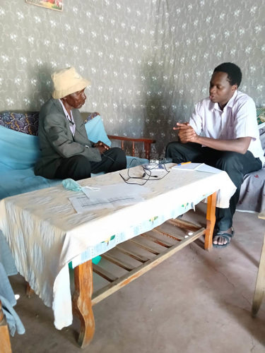 Peter Nyabande Ongidi being interviewed by Paul Ramogi in Kisumu County