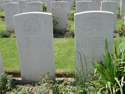 Two Commonwealth War Graves Headstones side by side in Tyne Cot Cemetery