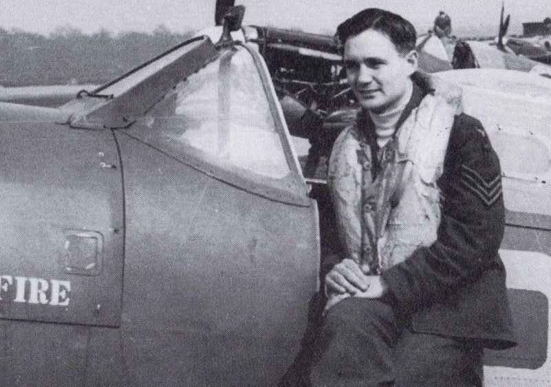 Sergeant Robert Mercer at the cockpit of his Spitfire